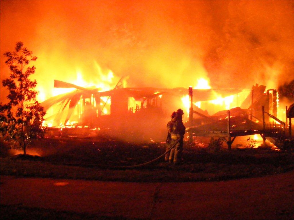 Fire fighters still trying to fight the flames in the collapsed building.